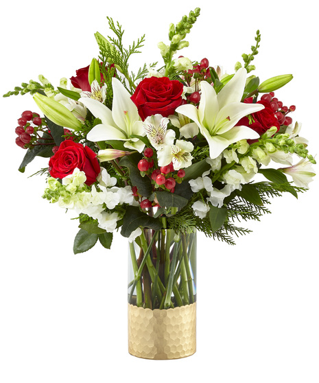 Red and White Holiday Flowers in a Designer Glass Vase
