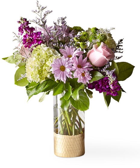Beautiful Flowers in a Designer Gold Base Vase