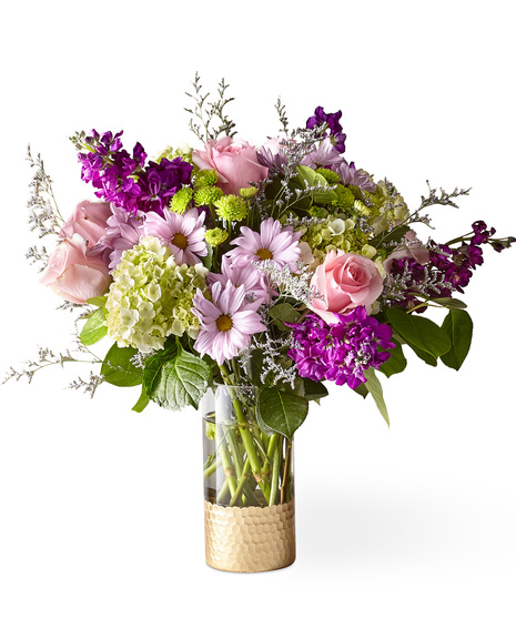 Beautiful Flowers in a Designer Gold Base Vase