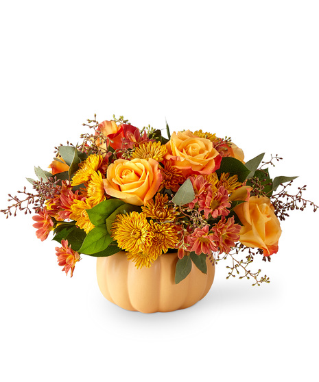 Fall Flowers Arranged in a Pumpkin Vase