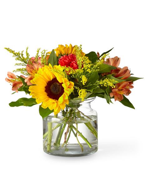 Sunflowers,  OrangeRoses and More in a Vase
