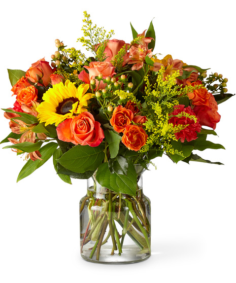 Sunflowers,  OrangeRoses and More in a Vase