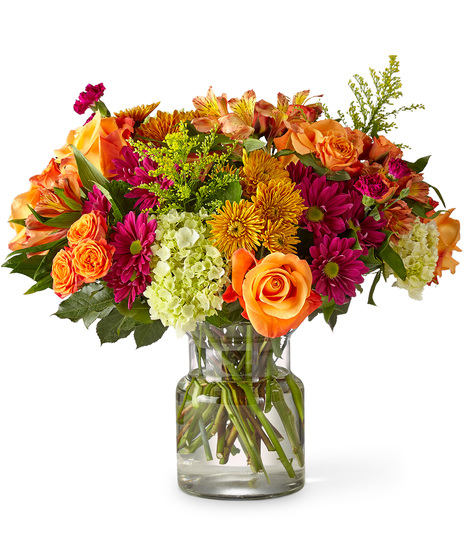 Bright Pink, Orange and Green Flowers in a Vase