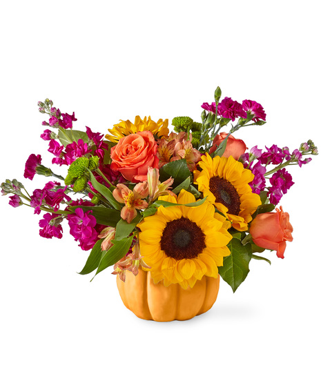 Flowers in a ceramic pumpkin