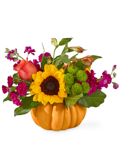 Flowers in a ceramic pumpkin