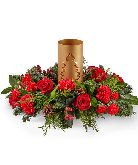 Holiday centerpiece with candle lantern