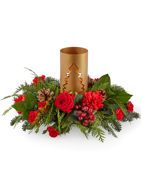 Holiday centerpiece with candle lantern