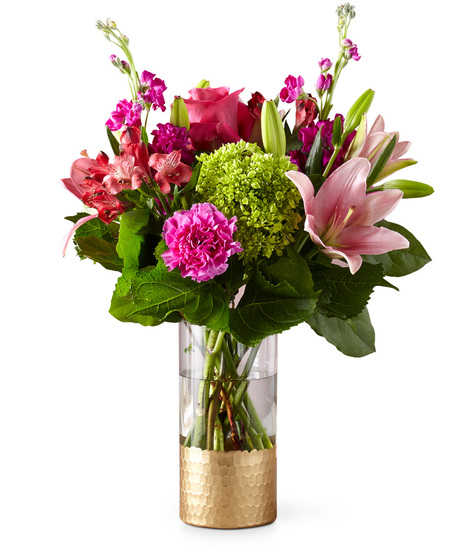 Beautiful Flowers in a Designer Gold Base Vase