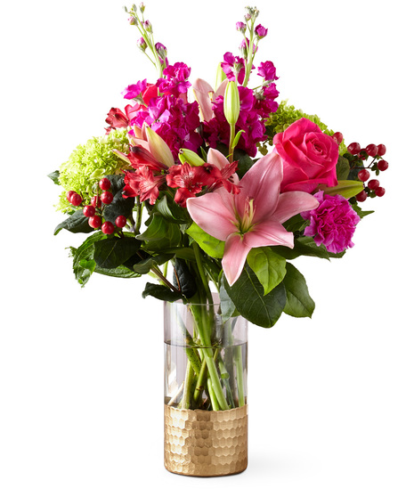 Beautiful Flowers in a Designer Gold Base Vase