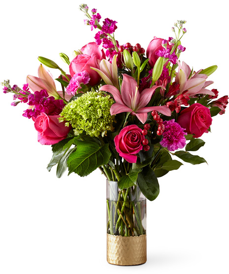 Beautiful Flowers in a Designer Gold Base Vase
