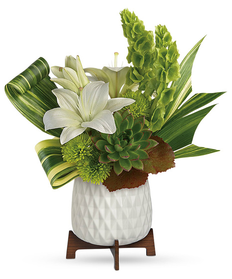 White and Green Flowers and Foliage in White Planter