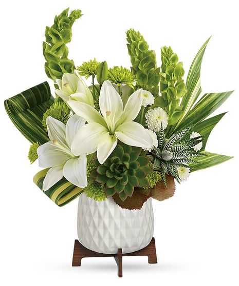 White and Green Flowers and Foliage in White Planter