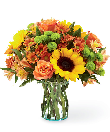 Autumn Flowers Arranged in a Glass Vase