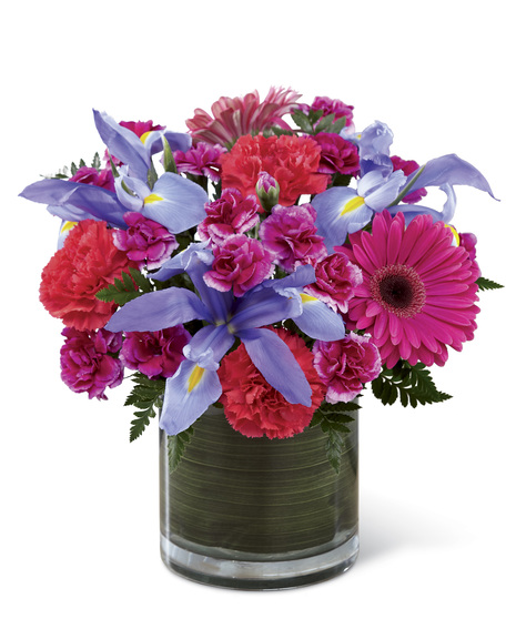 Pink, Hot Pink and Blue Flowers in a Cylinder Vase