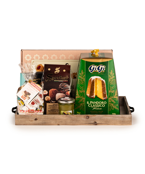 Rustic Holiday Harvest Tray with pandoro, pistachio spread, truffles, cookies, and holiday treats in a wooden tray