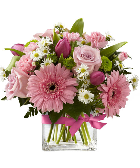 Pink and white flowers in a cube vase