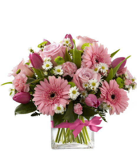 Pink and white flowers in a cube vase