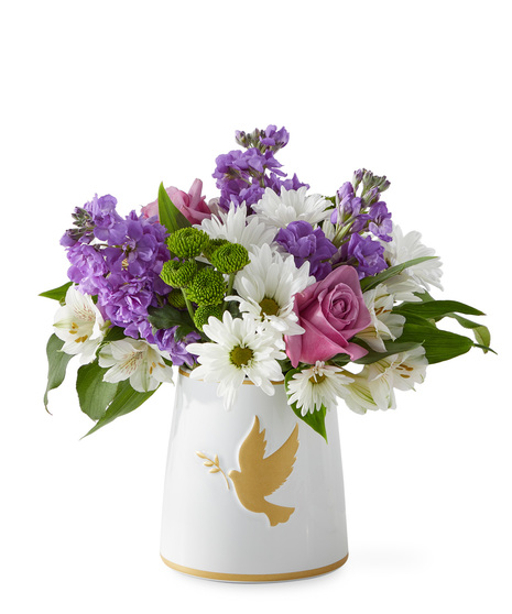 Sympathy flowers in a vase symbolizing love and peace