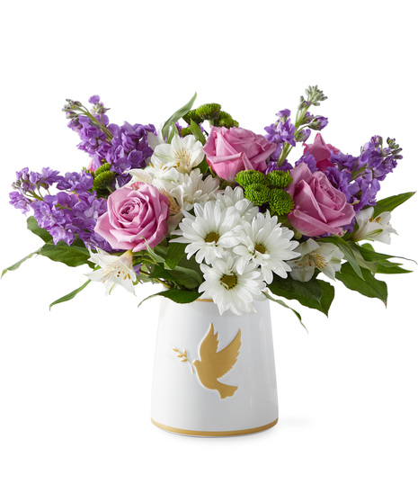 Sympathy flowers in a vase symbolizing love and peace