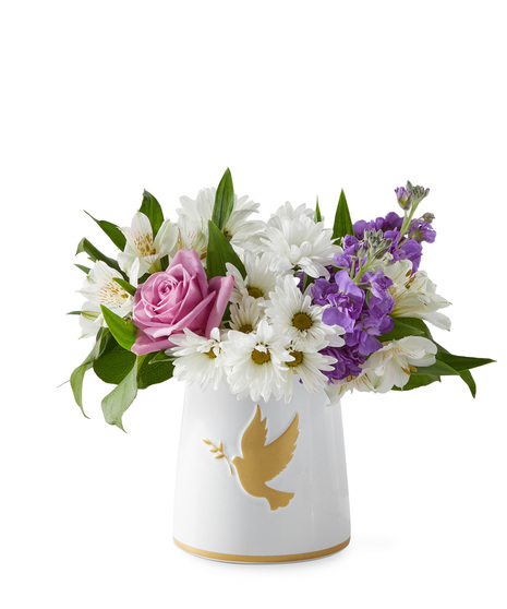 Sympathy flowers in a vase symbolizing love and peace