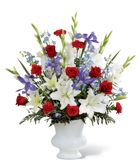 Red, White and Blue Flowers in and Urn