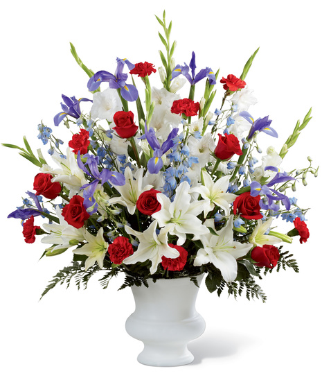 Red, White and Blue Flowers in and Urn