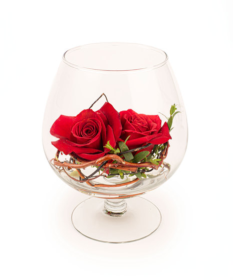 Red rose floral arrangement in a snifter glass with vine and greenery, available with one, two, or three roses.
