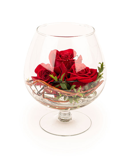 Red rose floral arrangement in a snifter glass with vine and greenery, available with one, two, or three roses.