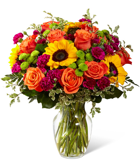 Vibrant flowers in a glass vase