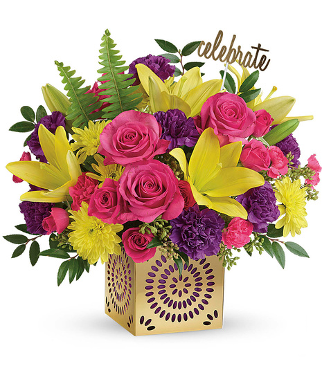 Bright birthday flowers in cube vase