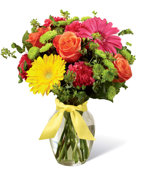 Vibrant flowers in a clear glass vase
