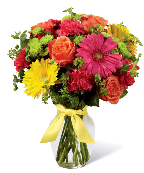 Vibrant flowers in a clear glass vase