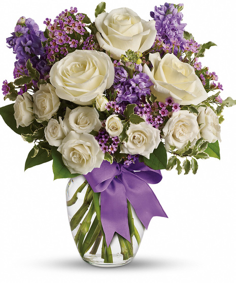 White and Lavender Flowers in a Glass Vase