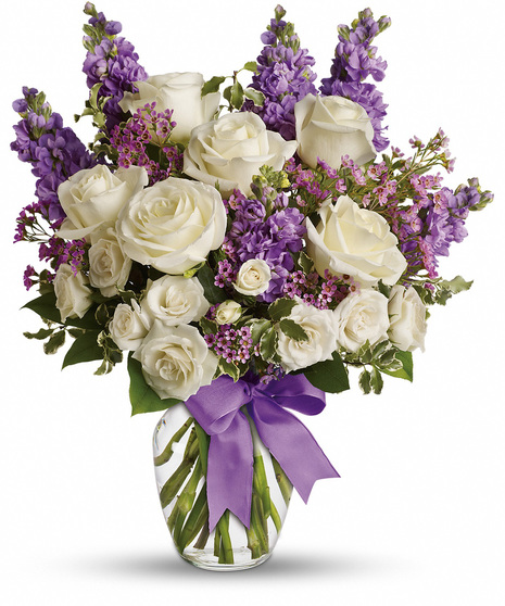 White and Lavender Flowers in a Glass Vase