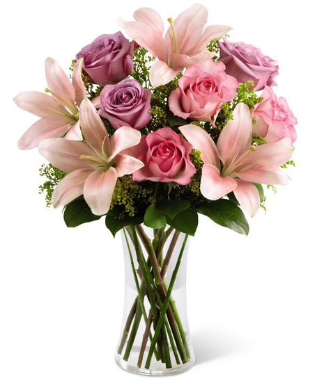 Pink Roses, Lavender Roses and Pink Lilies in a glass vase