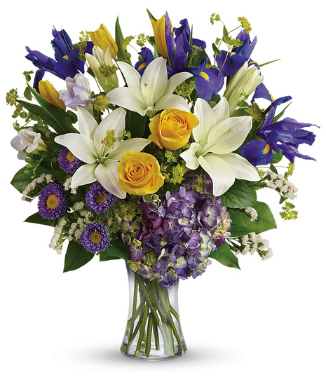 Spring bouquet in purple, yellow and white