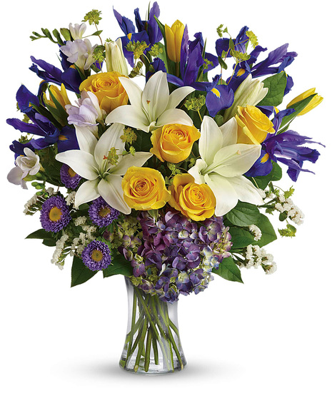Spring bouquet in purple, yellow and white