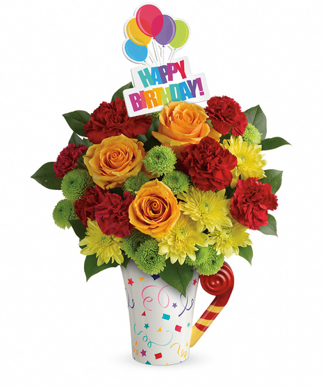 Birthday flowers in a festive mug