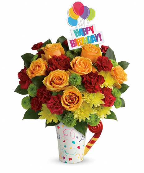 Birthday flowers in a festive mug