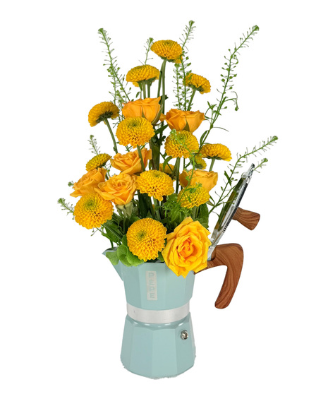 Yellow roses, button mums, and green bells in a light blue Pepe mocha coffee pot arrangement