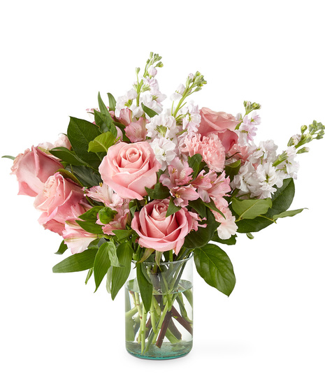 Pink flowers arranged in a glass vase