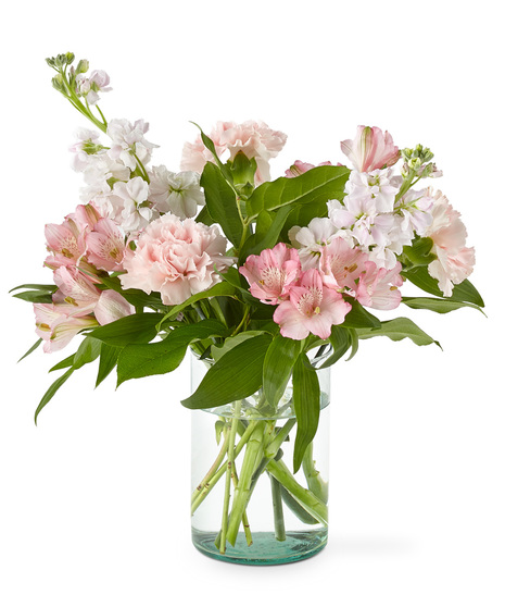 Pink flowers arranged in a glass vase