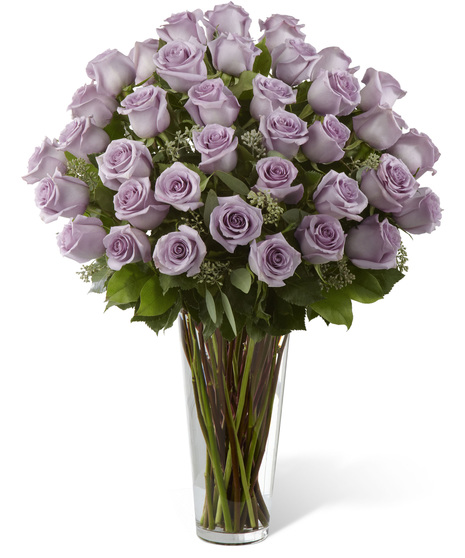 12-36 Lavender Roses in a Glass Vase