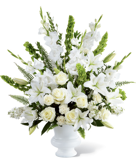 All white funeral tribute styled arrangement
