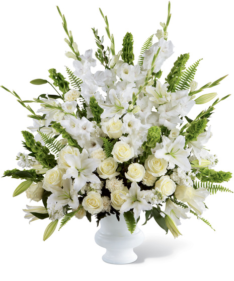 All white funeral tribute styled arrangement