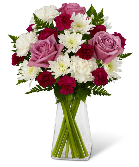 Lavender roses, mums and mini carnations in a vase