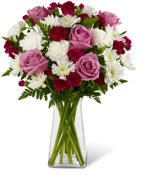 Lavender roses, mums and mini carnations in a vase