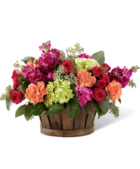 Mixed vibrant flowers in a basket