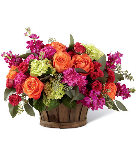 Mixed vibrant flowers in a basket