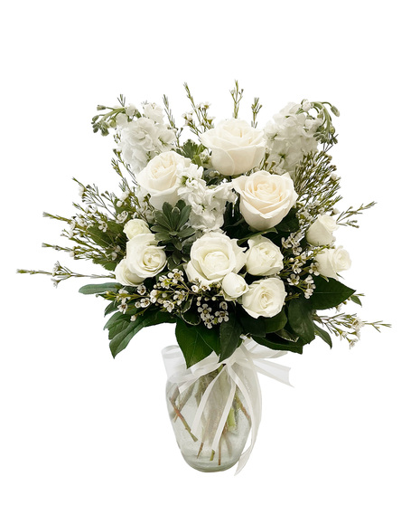 White Flowers designed in a clear glass vase